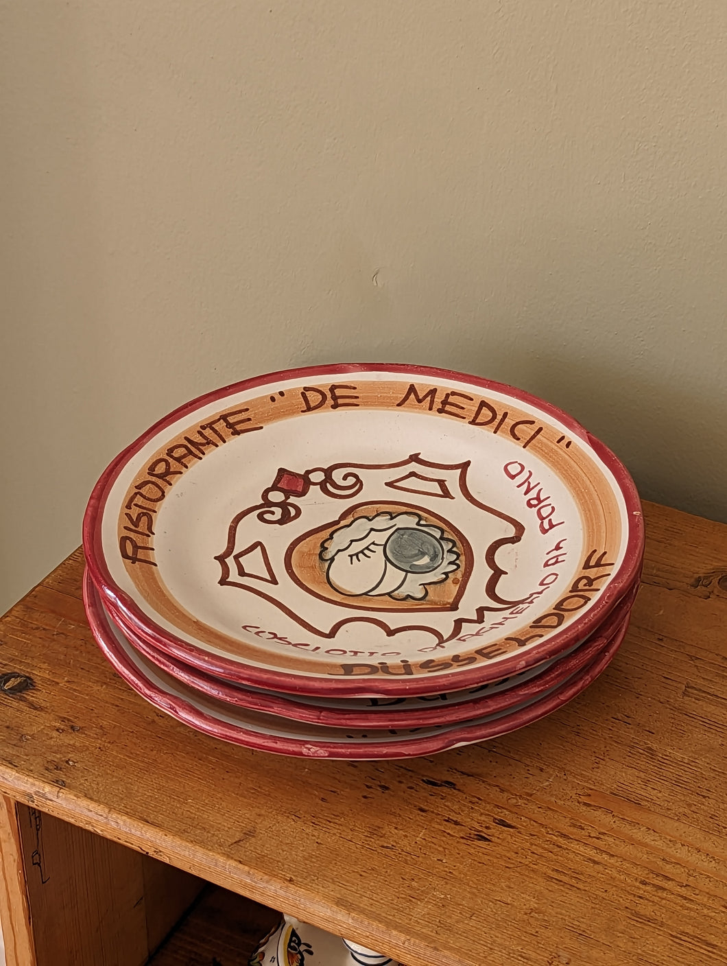 three Italian restaurant plates